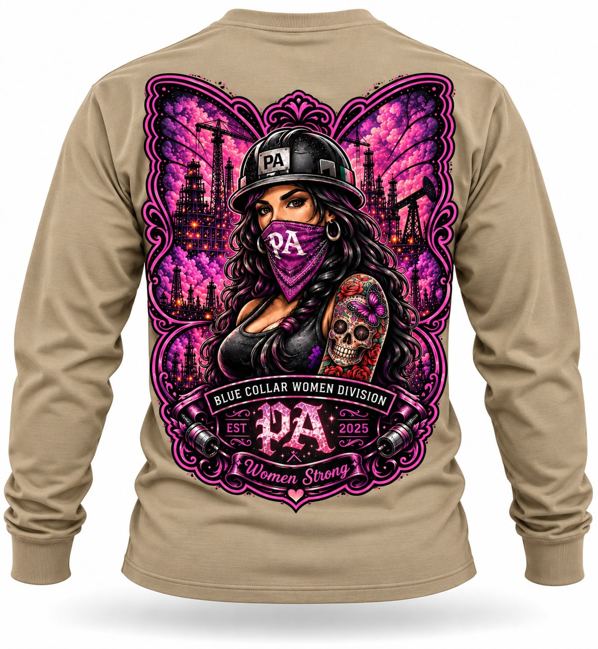 Tan long sleeve shirt featuring a vibrant pink and black graphic of a woman in a hard hat with industrial background.