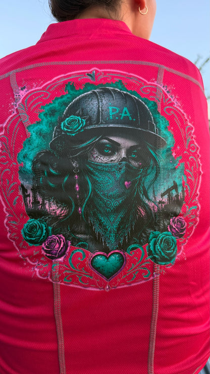 Women's hot pink performance long sleeve work shirt featuring a detailed graphic of a woman in a hard hat on the back.